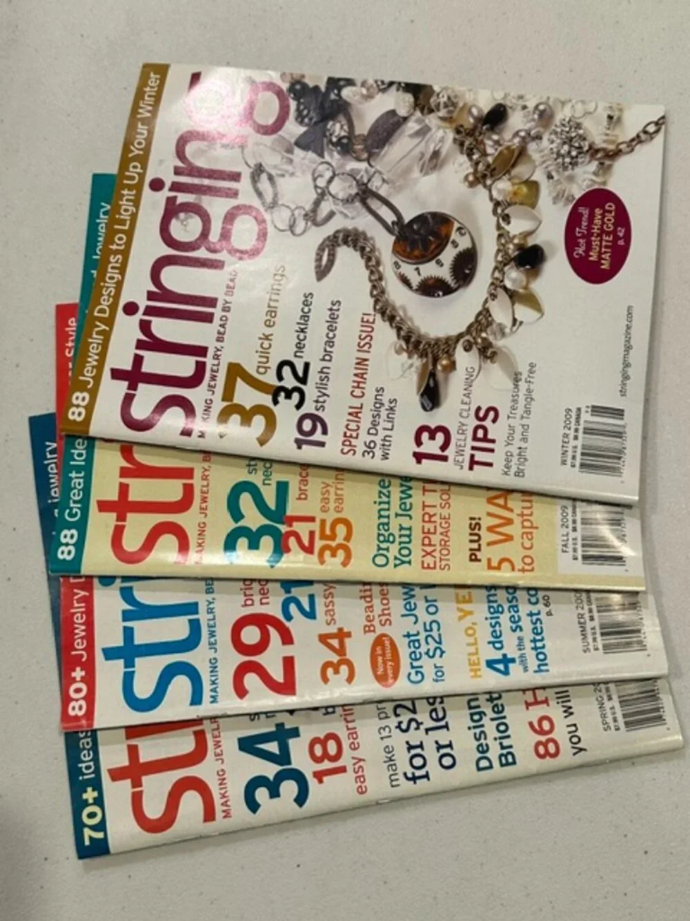 FOUR (4) Issues of Stringing Magazine-Spring, Summer, Fall & Winter 2009